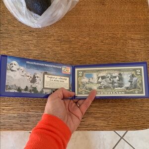Mount Rushmore National Memorial colorized $2 bill set in protective plastic